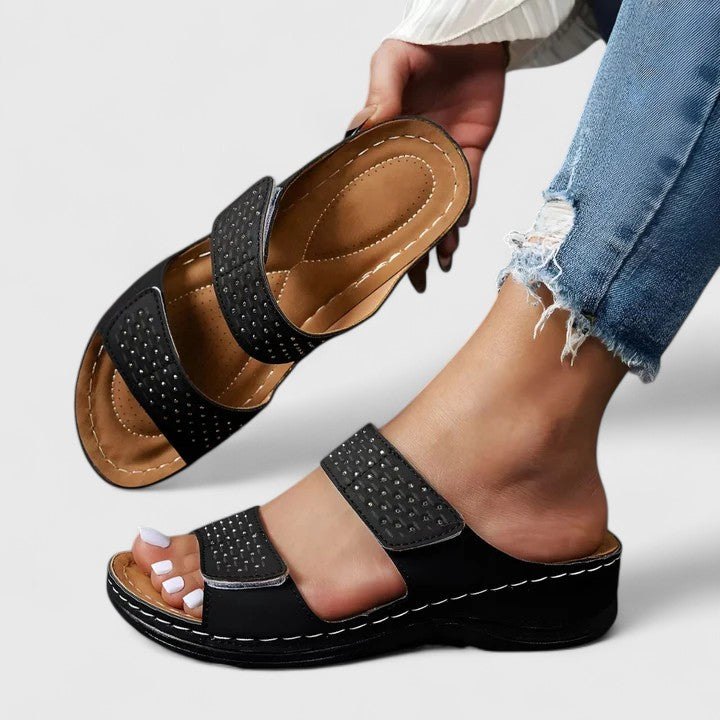 Walk comfortably in women's orthopaedic sandals. Designed for support, lightweight feel & non-slip wear.