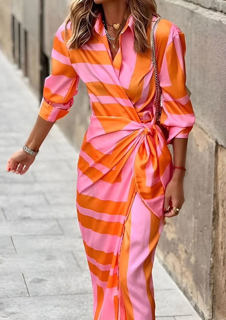 Women's comfortable striped midi wrap dress, easily transitions from casual to elegant settings.
