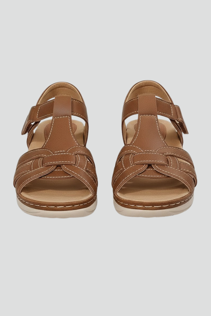 Women's open-toe strap sandals in a neutral tone, perfect for effortless summer style & warm weather.