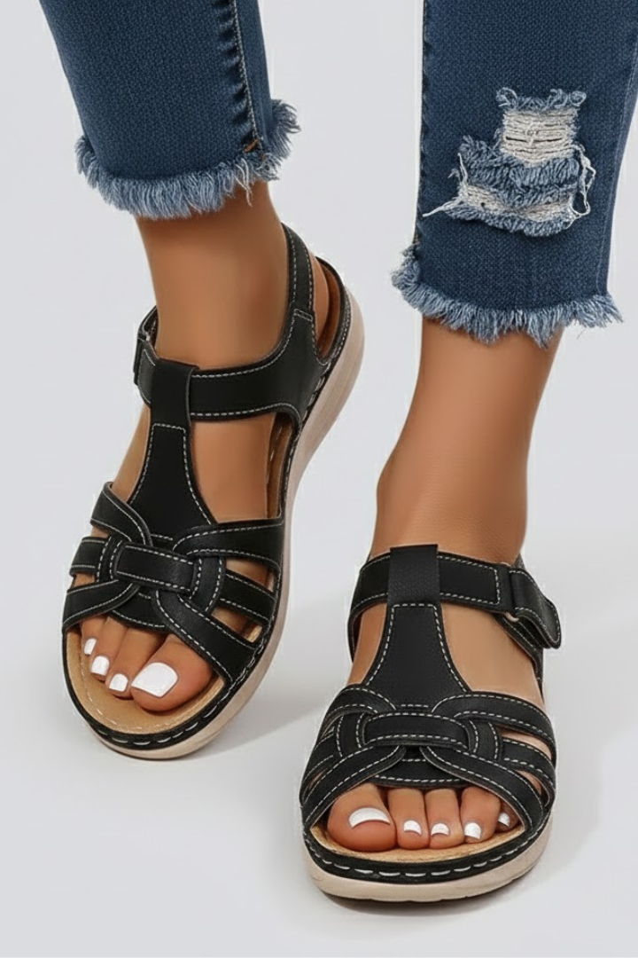 Classic women's open-toe strap sandals, offering comfortable and casual summer style for any outfit.