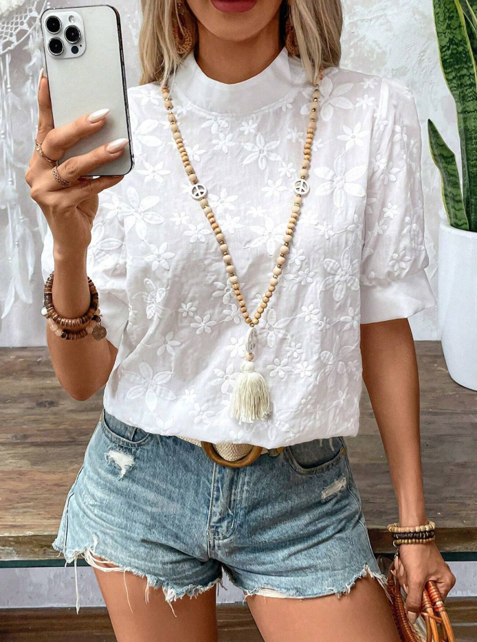 Chic white embroidered women's blouse featuring a sophisticated stand-up collar, combining elegance & modern style.