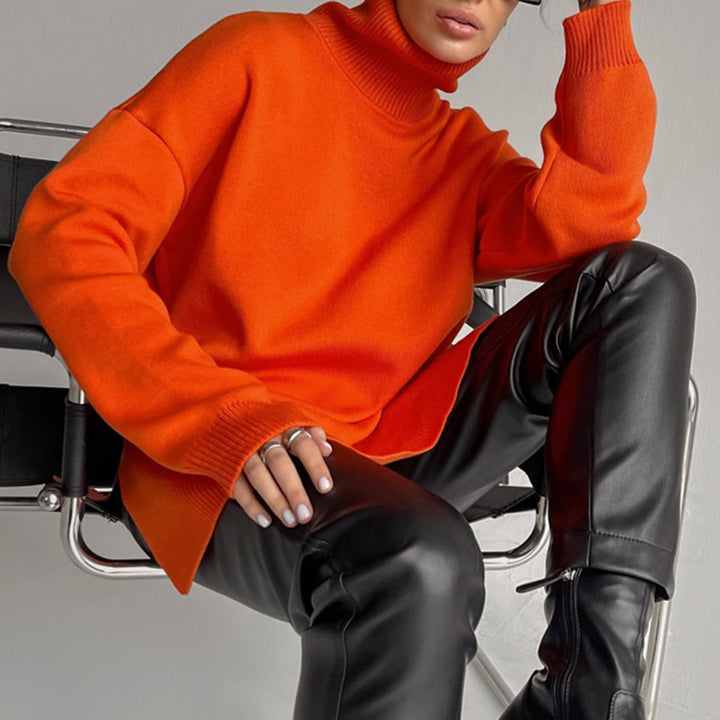 Elegant women's turtleneck sweater, relaxed fit with side splits, ideal for casual or chic winter fashion.