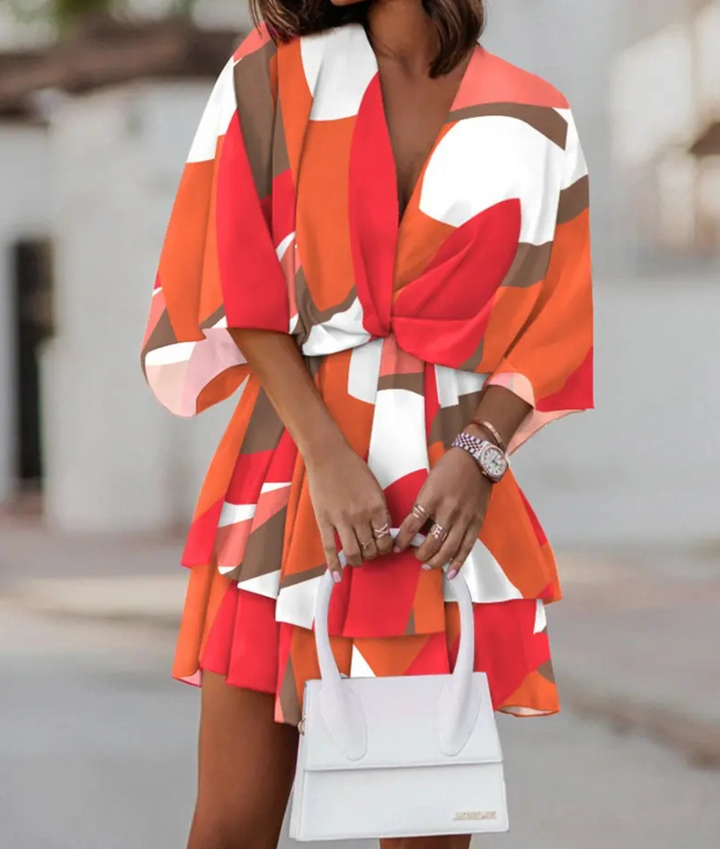 Women's summer day dress: a chic bohemian floral mini with ruffles, great for any casual occasion.
