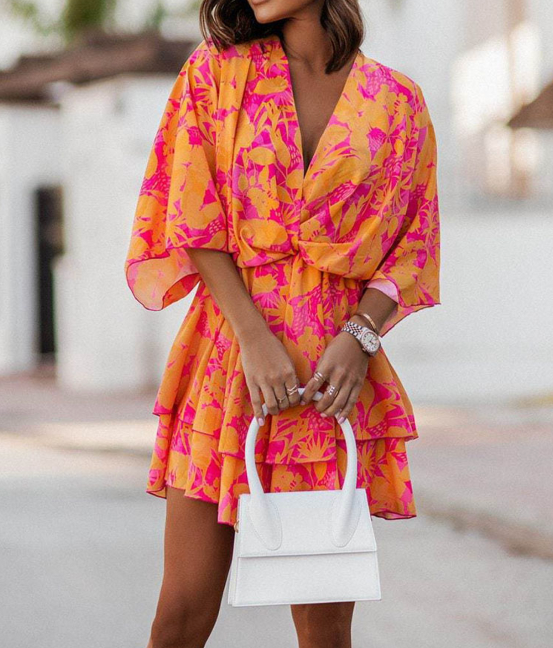 Women's bohemian floral mini dress with ruffles, ideal for summer vacation and casual wear.