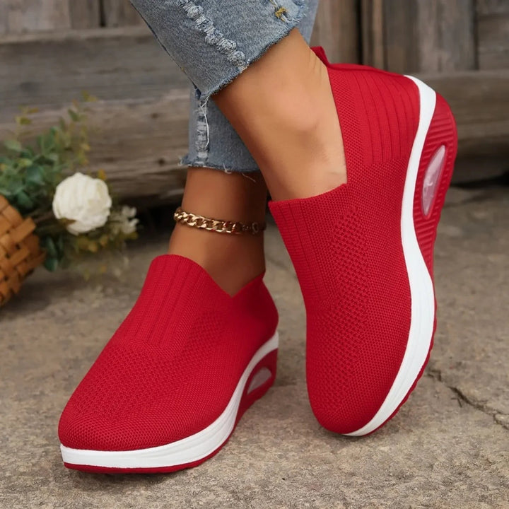 Modern women's slip-on sneakers with cushioned footbed and flexible sole for casual wear.