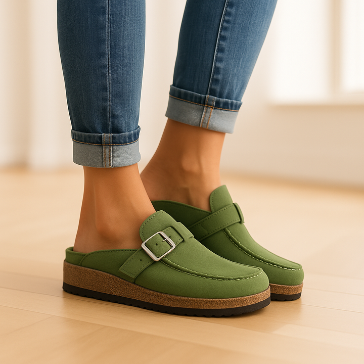 Supportive women's buckle sandals with a comfortable flat sole and adjustable strap, great for casual summer footwear.