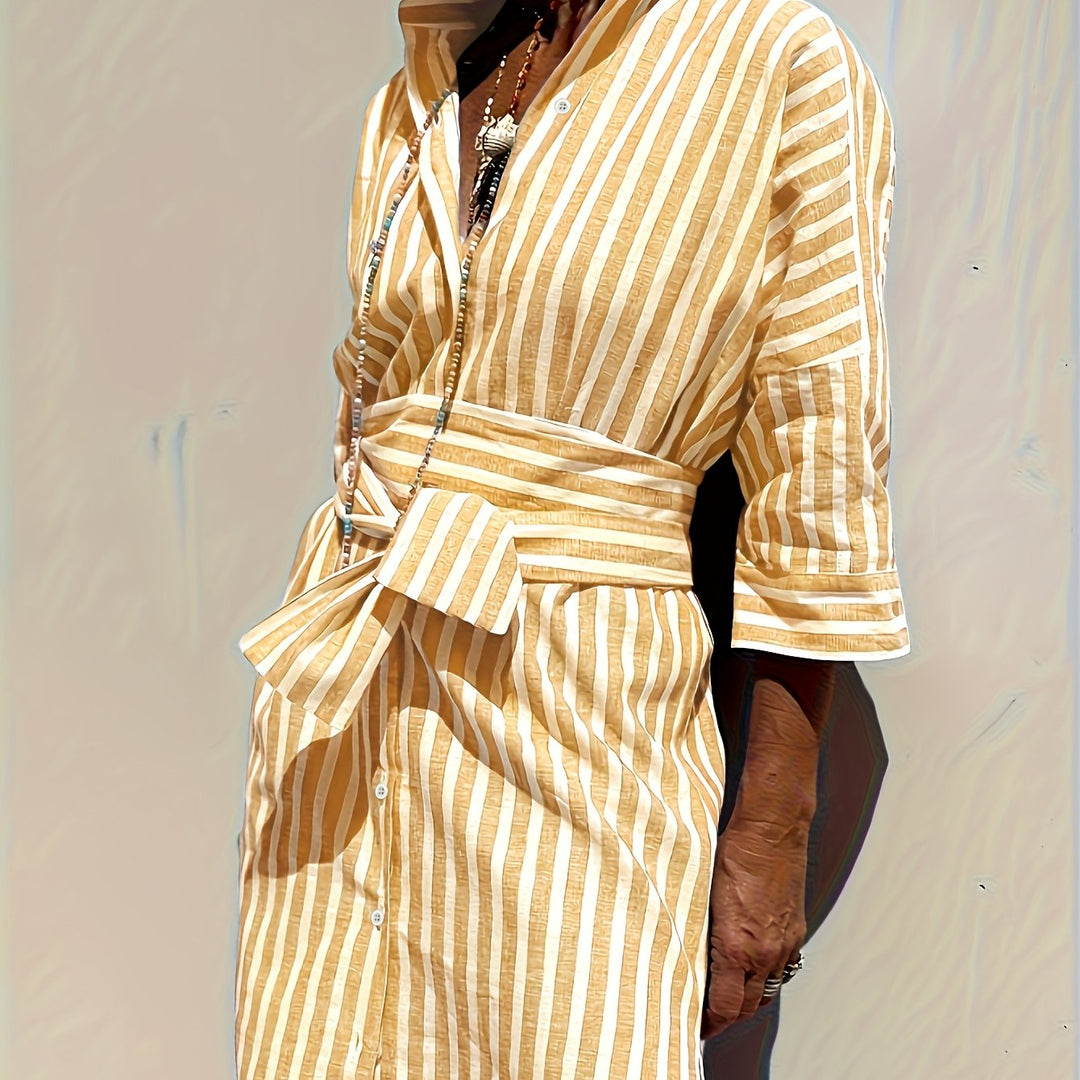 Chic women's striped belted dress, a simple yet sophisticated addition to any wardrobe.