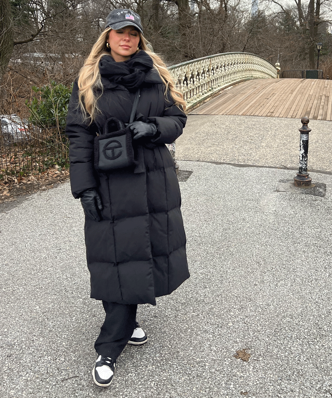 Warm women's long quilted coat, an elegant winter jacket ideal for cold weather outerwear.