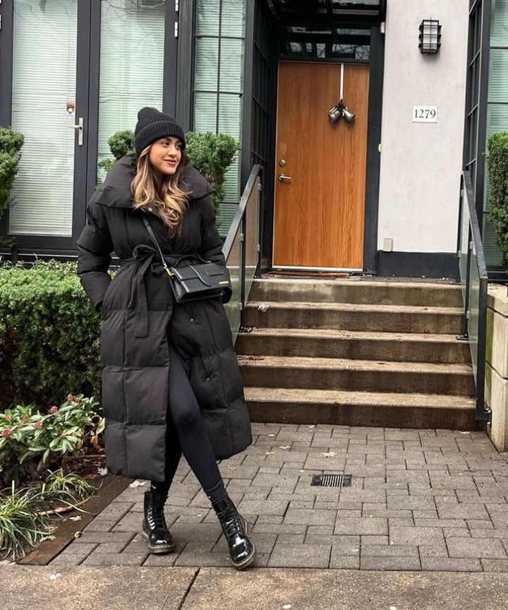 High-quality women's long quilted winter coat, an essential for a warm, elegant winter wardrobe.