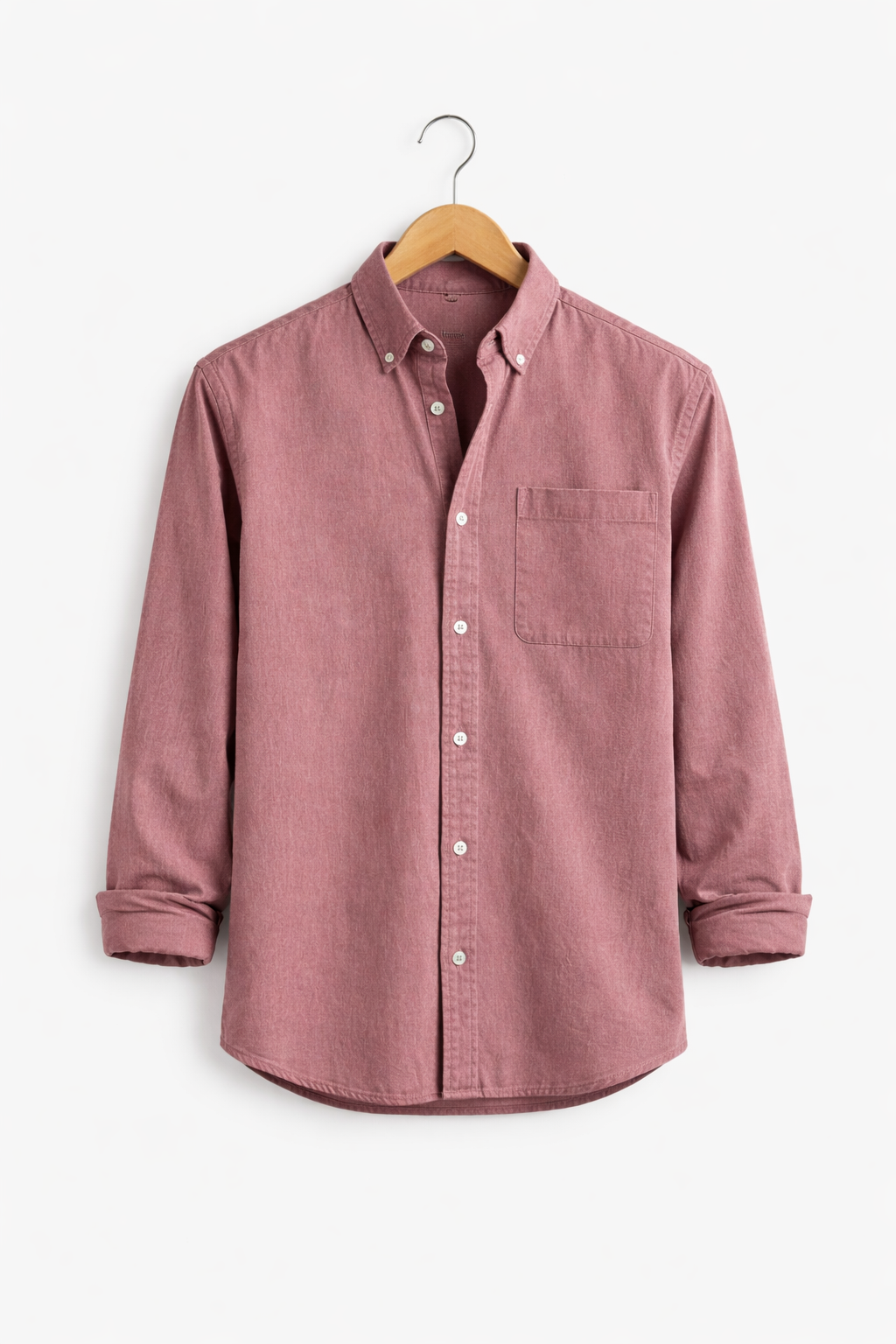 Classic men's chambray shirt, relaxed fit. Long sleeve button-up offers versatile, smart casual appeal.