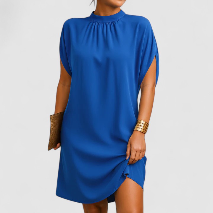 Fashionable women's summer dress with an elegant design and flattering fit. Chic details make it versatile.