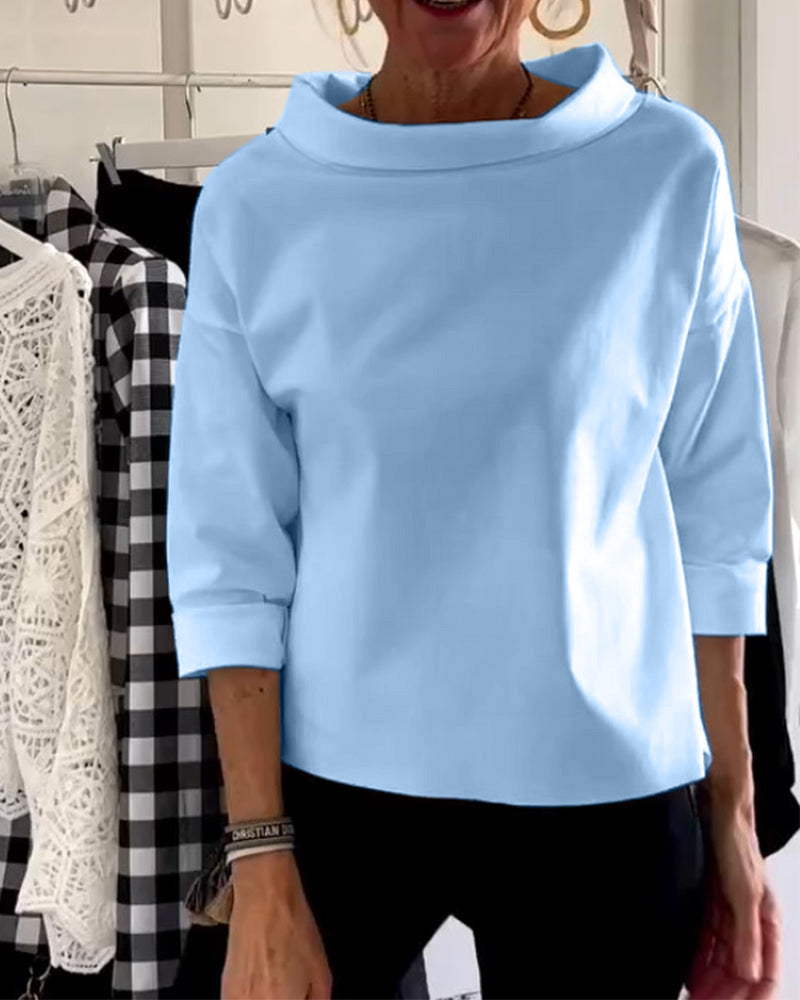 Stylish 3/4 sleeve women's blouse, an elegant collared top perfect for summer or autumn fashion.