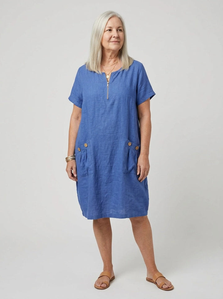 Women's red zip-front summer dress with V-neck, relaxed fit & pockets for casual everyday comfort.