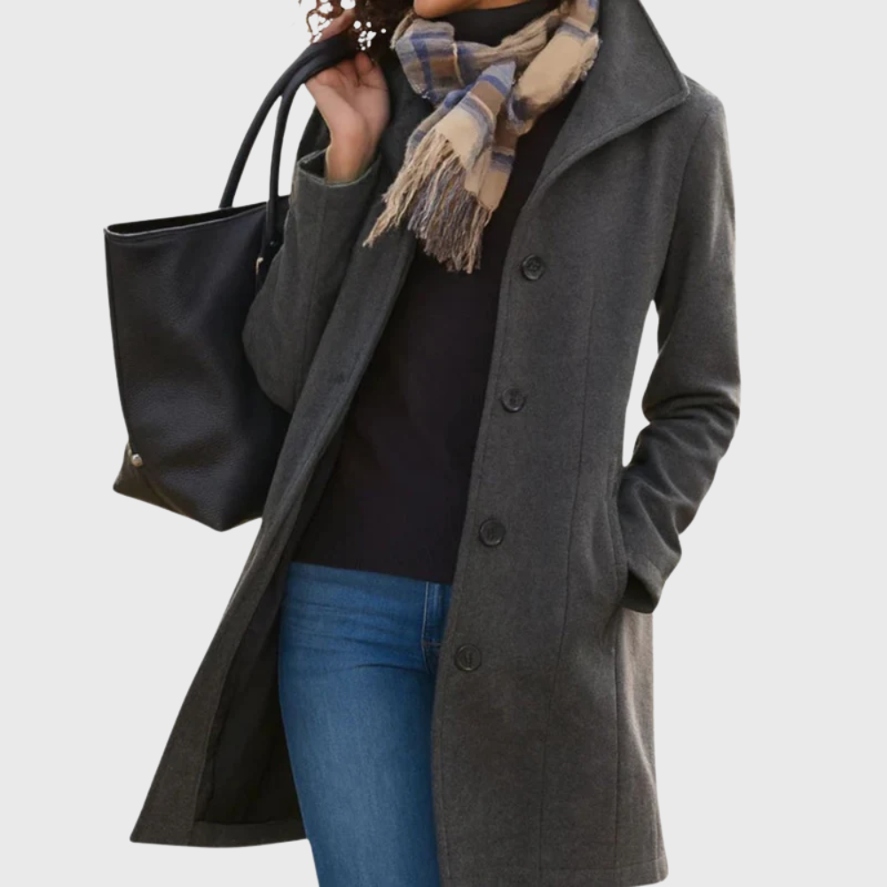 Sophisticated women's longline coat, featuring a button-front; versatile for elegant fall & winter layering.