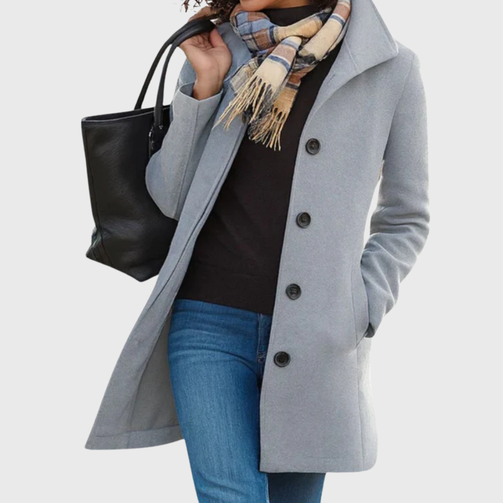 Women's elegant longline coat with button closure, a sophisticated choice for fall and winter fashion.