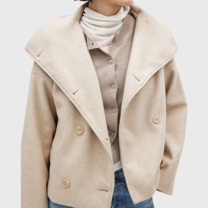 Elegant black women's cropped double-breasted coat, perfect chic outerwear for winter.