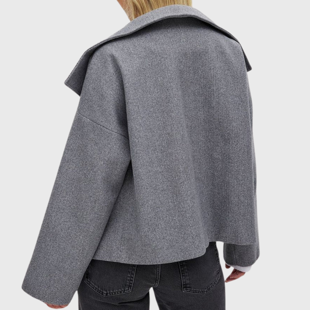 High-quality women's cropped double-breasted coat, essential elegant fashion outerwear.