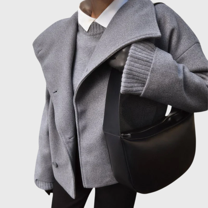 Sophisticated women's cropped double-breasted coat in a fashionable, modern design.