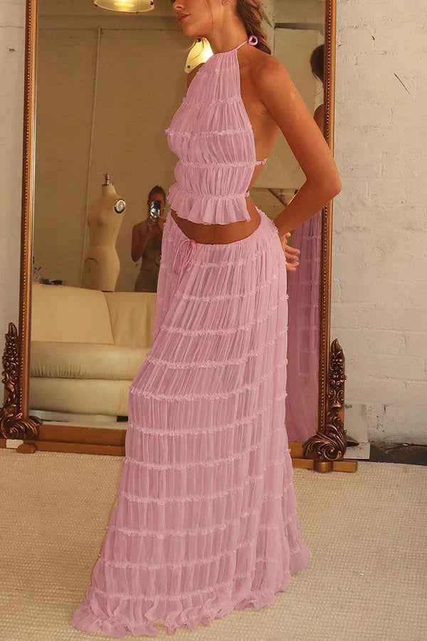 Vibrant women's flowy boho summer set, a stylish two-piece outfit for sunny days and holidays.