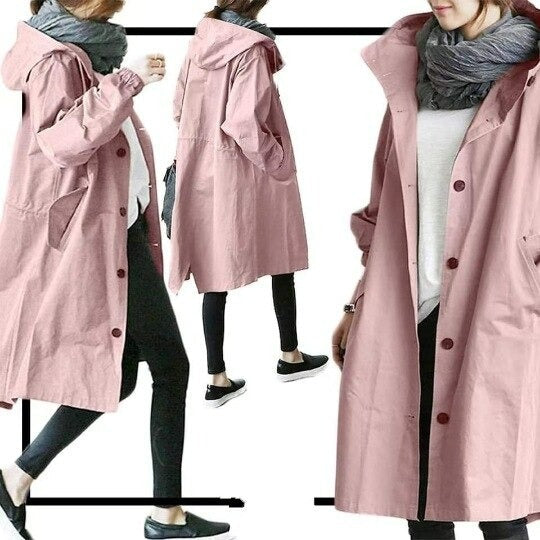 Stylish woman wearing an elegant waterproof trench coat, walking in fall rain. Versatile outerwear jacket.
