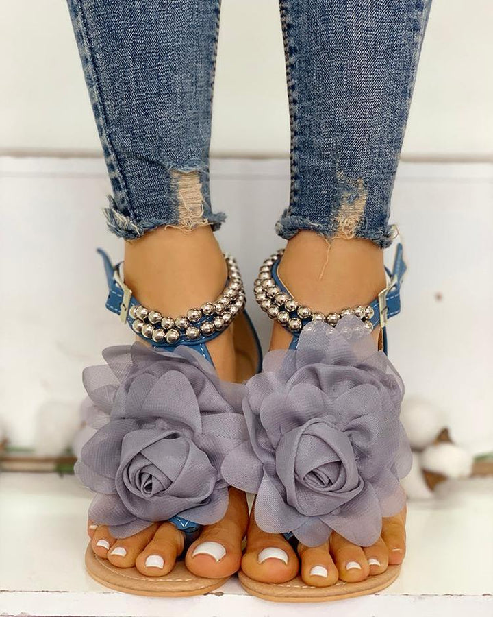 Women's comfortable flat summer sandals, featuring elegant flower & pearl bead detailing on straps.