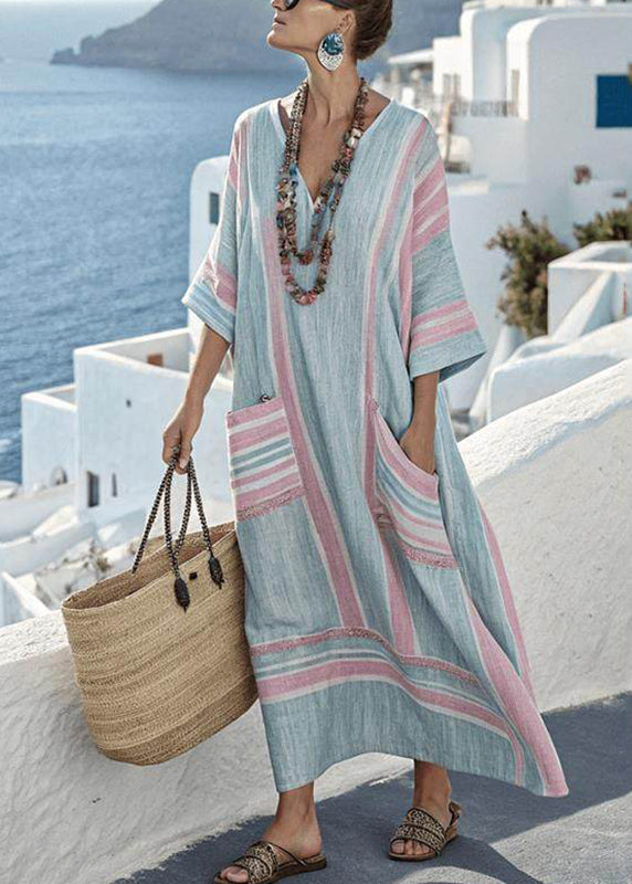 Comfortable women's plus size striped patchwork maxi dress, flowy short sleeve for summer casual wear.