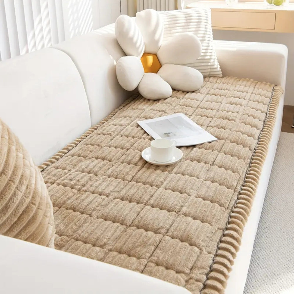 Pet-friendly plush fleece sofa protector. Non-slip quilted mat keeps furniture safe from pet hair and scratches.