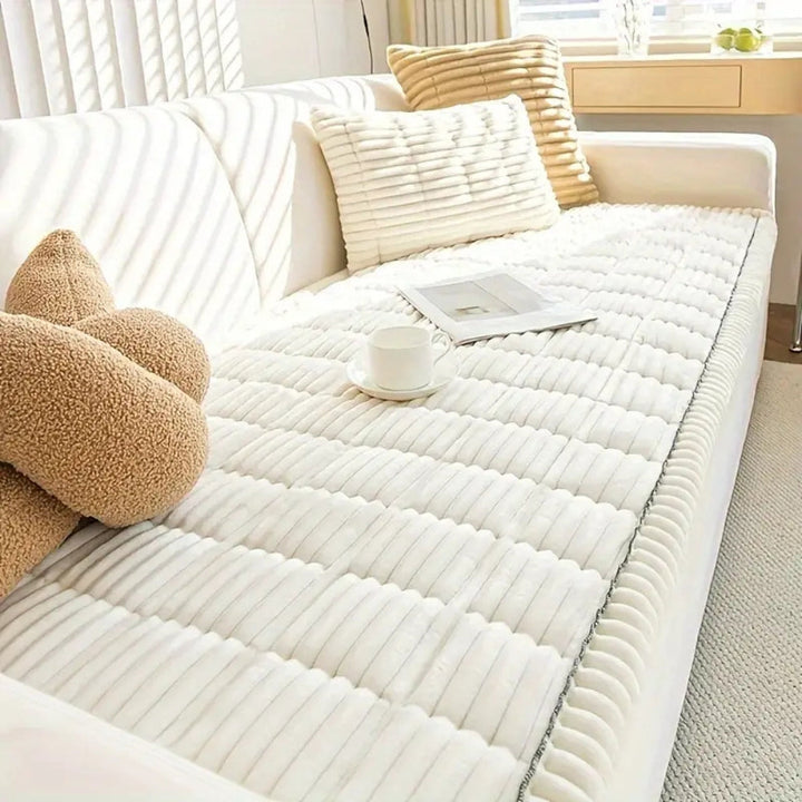Soft plush fleece sofa cover, quilted for extra comfort. Ideal non-slip furniture protector for living rooms.