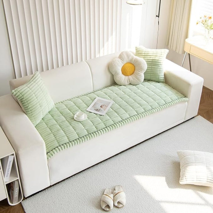 Comfortable plush fleece sofa protector, non-slip & quilted. Protects furniture while adding style to your living space.