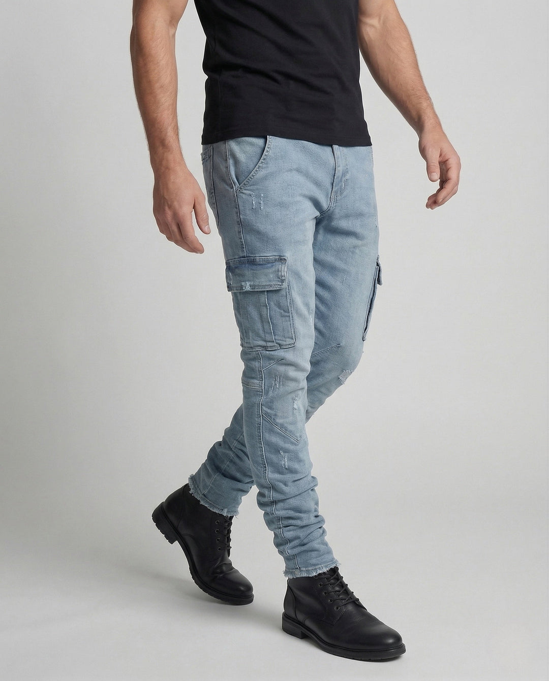 Modern men's slim fit utility jeans, featuring functional cargo pockets for versatile everyday wear.