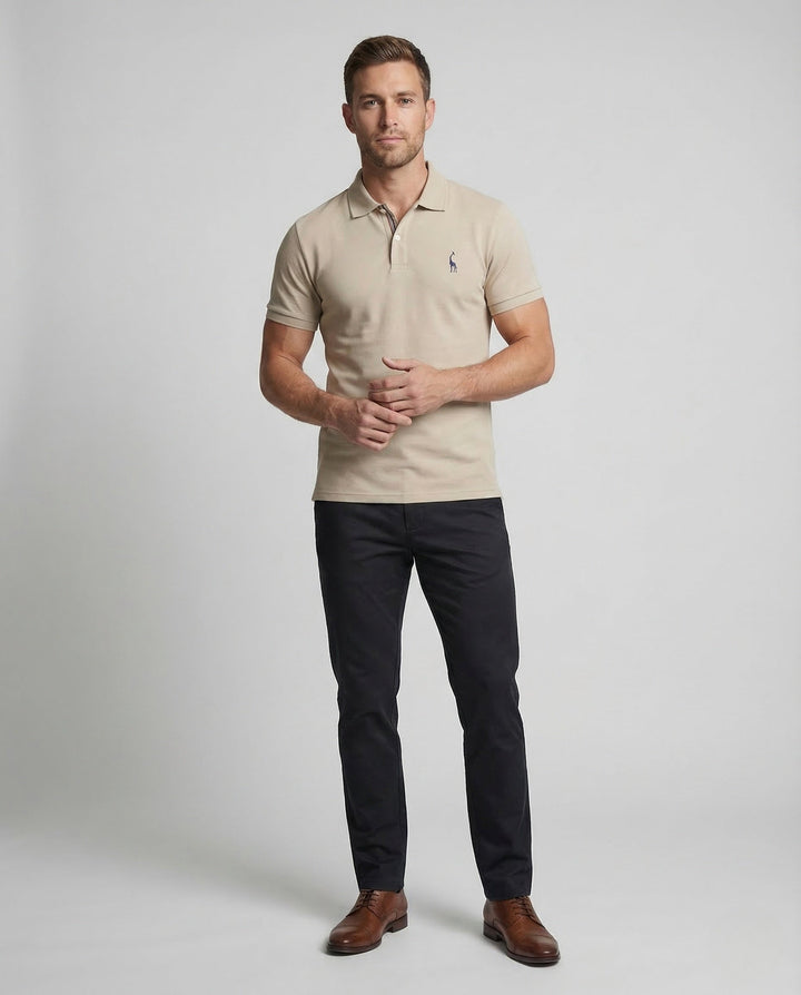 Men's classic navy short sleeve polo shirt with embroidered chest emblem. Perfect for smart casual wear.