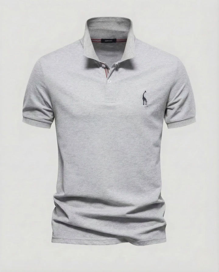 Men's red classic short sleeve polo shirt, featuring an embroidered chest emblem. Great for versatile casual style.