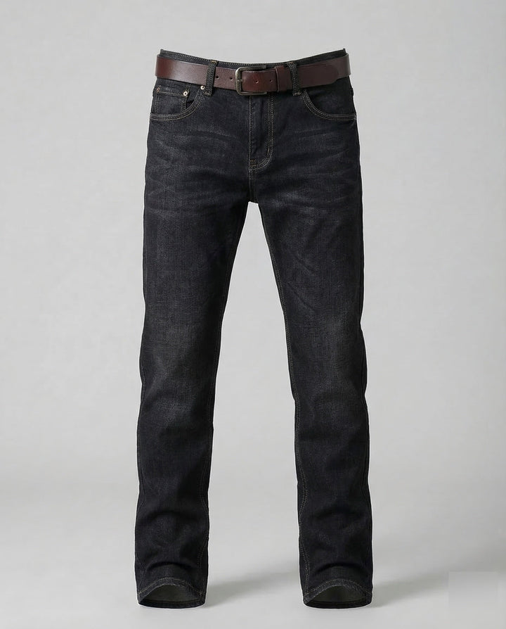 Close-up of the flexible stretch denim fabric on men's everyday slim fit comfort jeans.