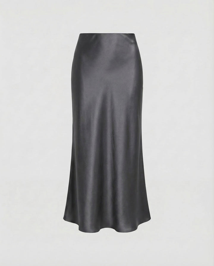 Pretty pink flowy midi skirt, a high-waist women's bottom for elegant spring and summer outfits.