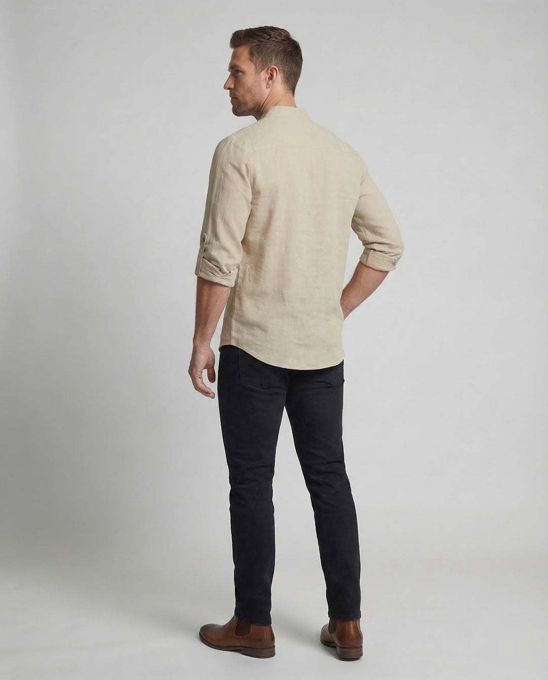 Lightweight men's summer shirt with roll-up sleeves and decorative laced collar.