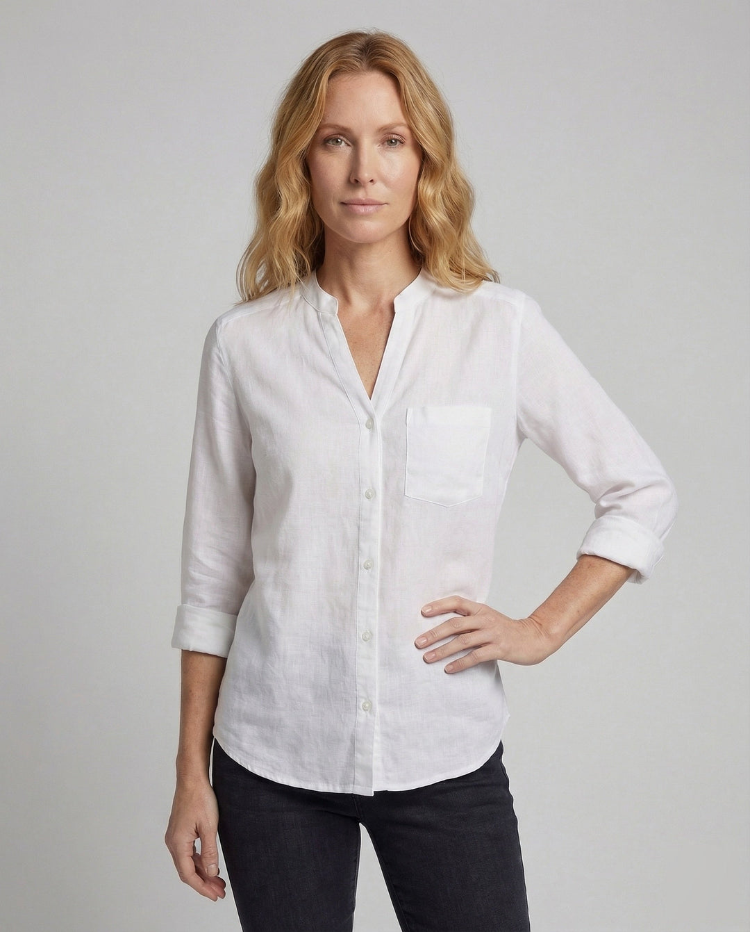 Relaxed fit women's stand collar shirt. Stylish long sleeve top with chest pocket, perfect for casual everyday wear.