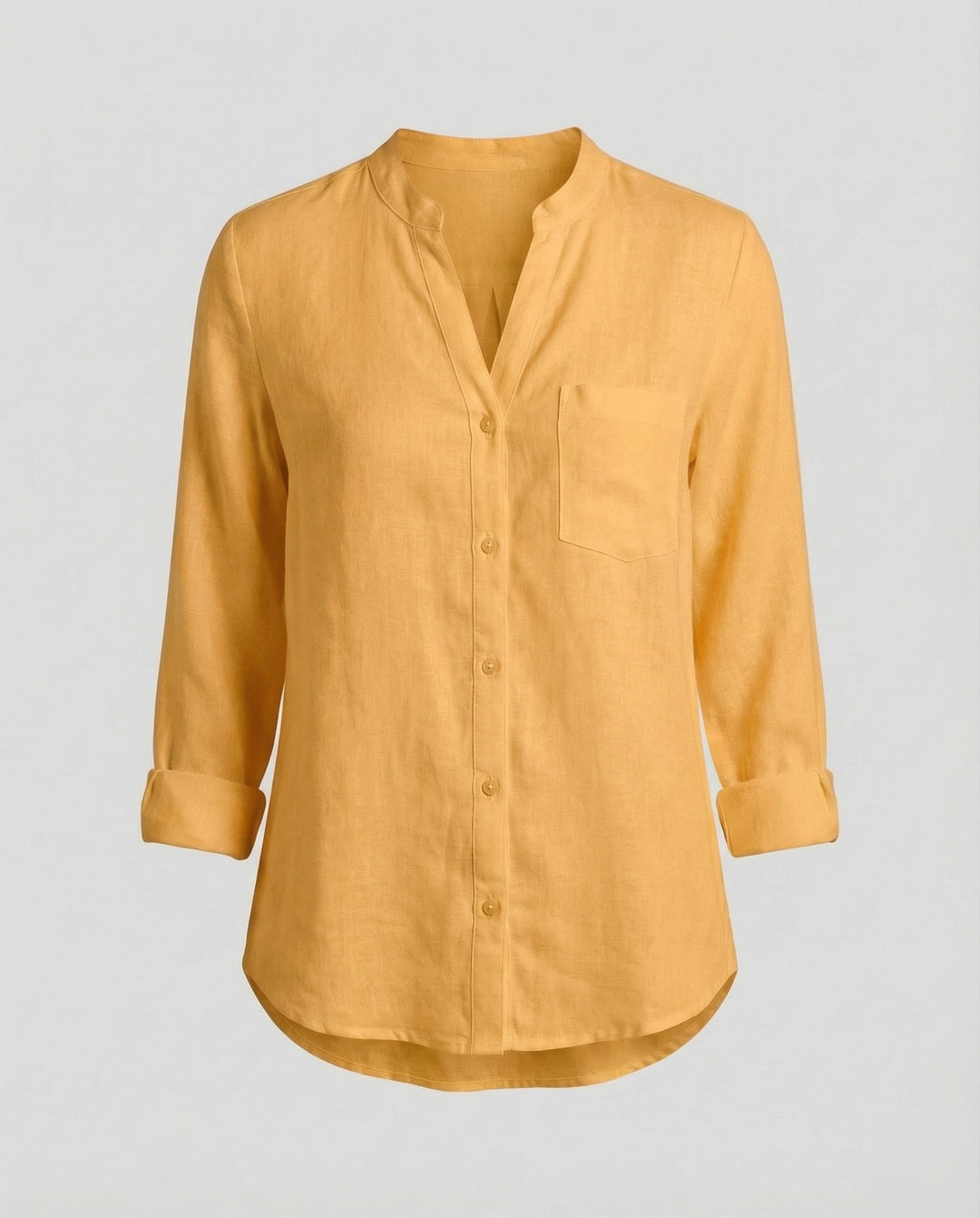 Detail of women's stand collar shirt. Relaxed fit, long sleeve button-up top featuring a stylish chest pocket for fashion.