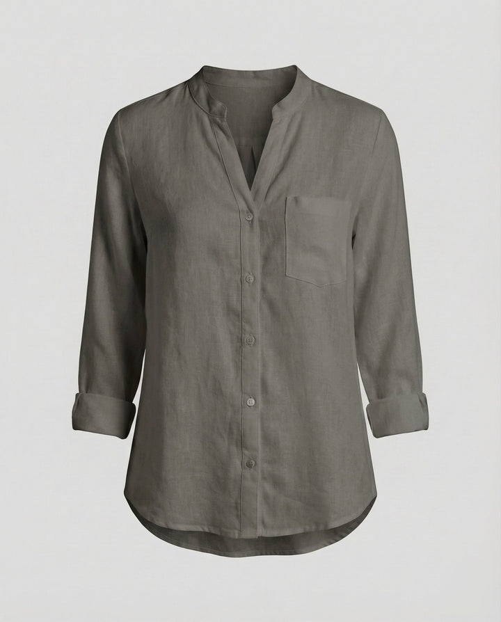Stylish women's relaxed fit stand collar shirt. Long sleeve button-up with chest pocket, perfect as a versatile office blouse.