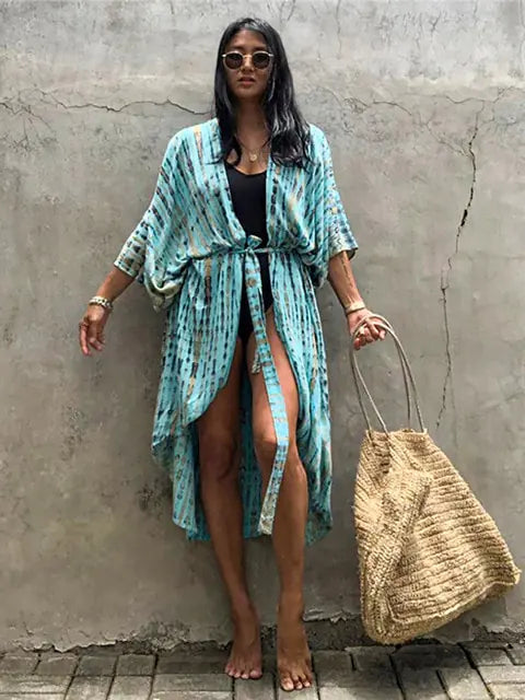 Stylish women's beach wrap, a versatile swimsuit cover-up for resort wear.