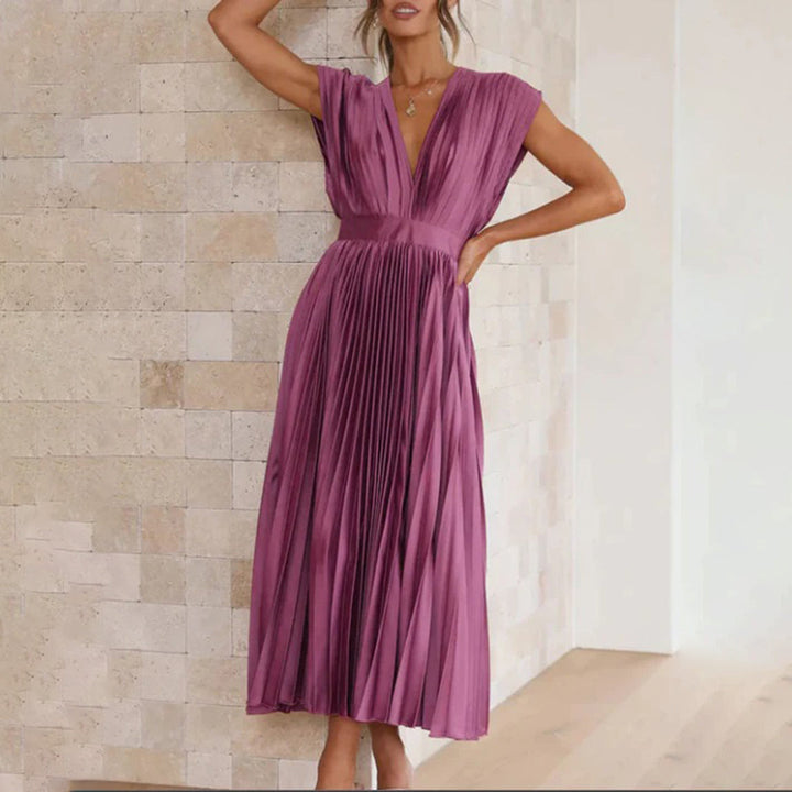 Elegant women's flowy midi dress, offering a flattering fit for every occasion, formal or casual.