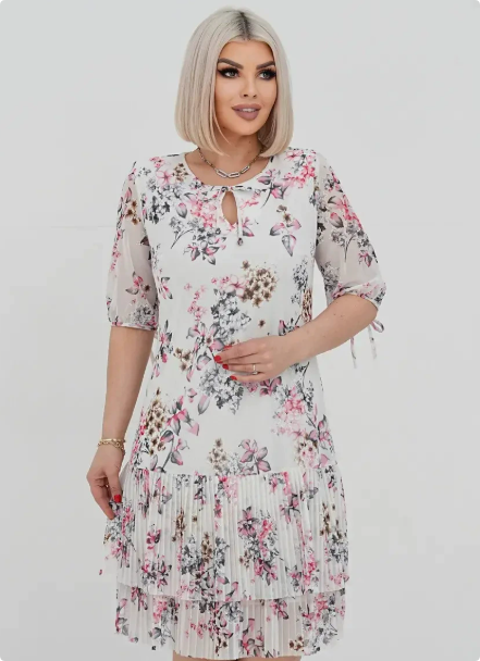 Chic women's tiered floral midi dress featuring elegant puff sleeves, great for parties and special occasions.
