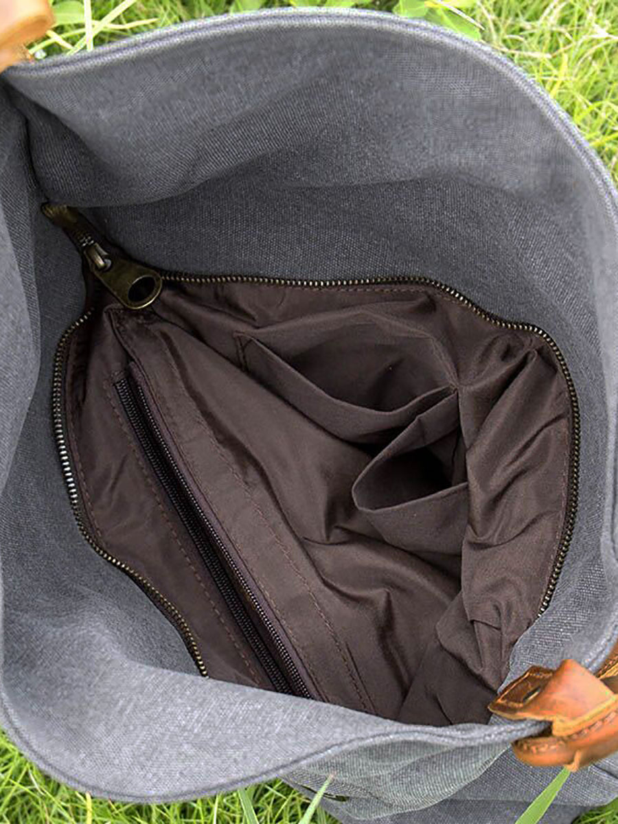 Versatile women's everyday bag: asymmetrical slouchy shoulder style with secure button.