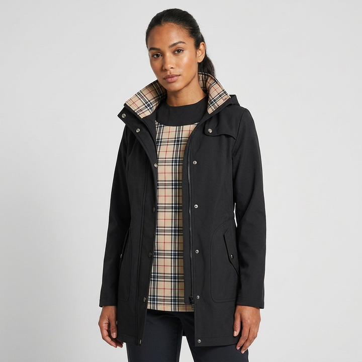 Woman wearing a stylish lightweight hooded casual jacket with drawstring waist, ideal for everyday outdoor activities.