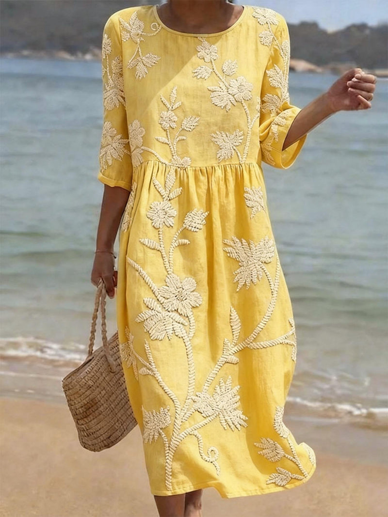 Fashionable women's elegant floral round neck midi dress, perfect for summer parties or chic daytime wear.