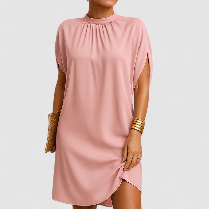 Elegant women's summer dress with flattering fit, perfect for day or evening wear. Chic and comfortable fashion.