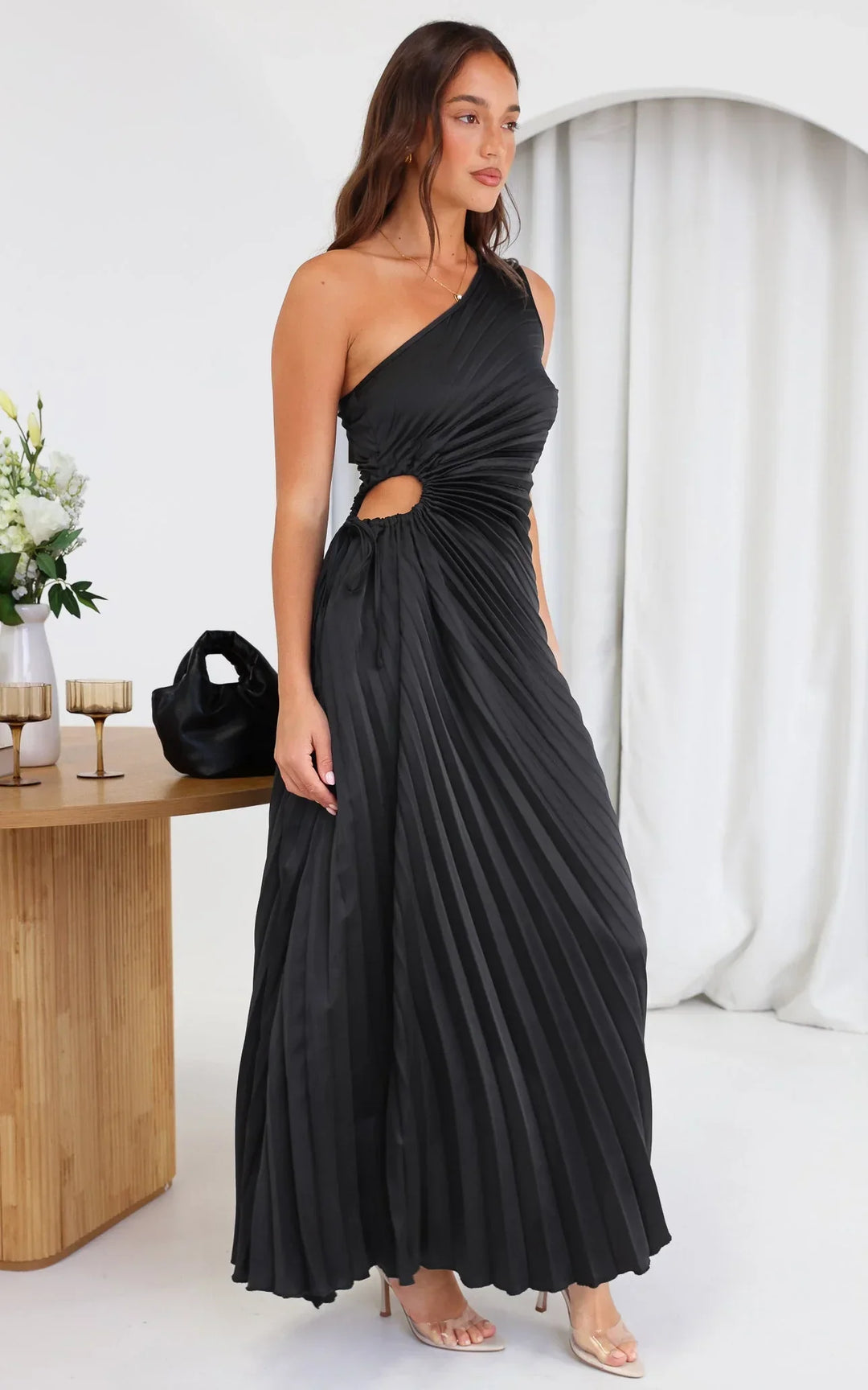 Women's formal asymmetrical midi dress, pleated and perfect for evening events.
