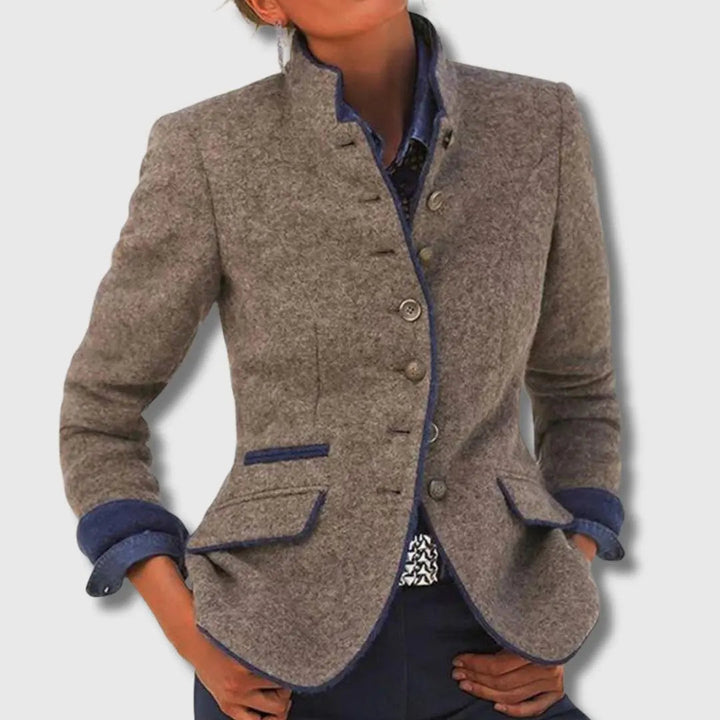 Women's fitted collared blazer with button front, ideal for professional business casual office wear and fall fashion.