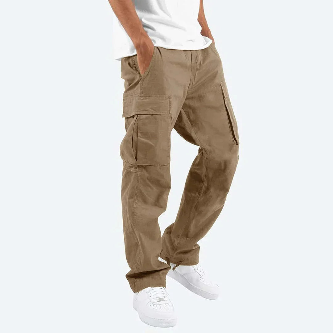 Tough men's utility trousers, designed with numerous pockets for outdoor adventures & work functionality.