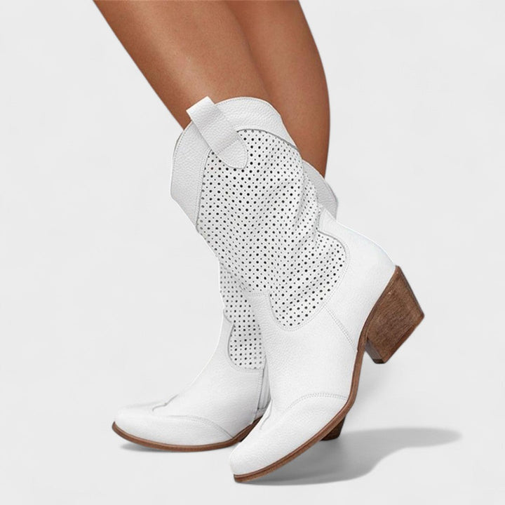 Stylish women's western ankle boots, offering comfort & chic design. Versatile everyday fashion footwear for women.