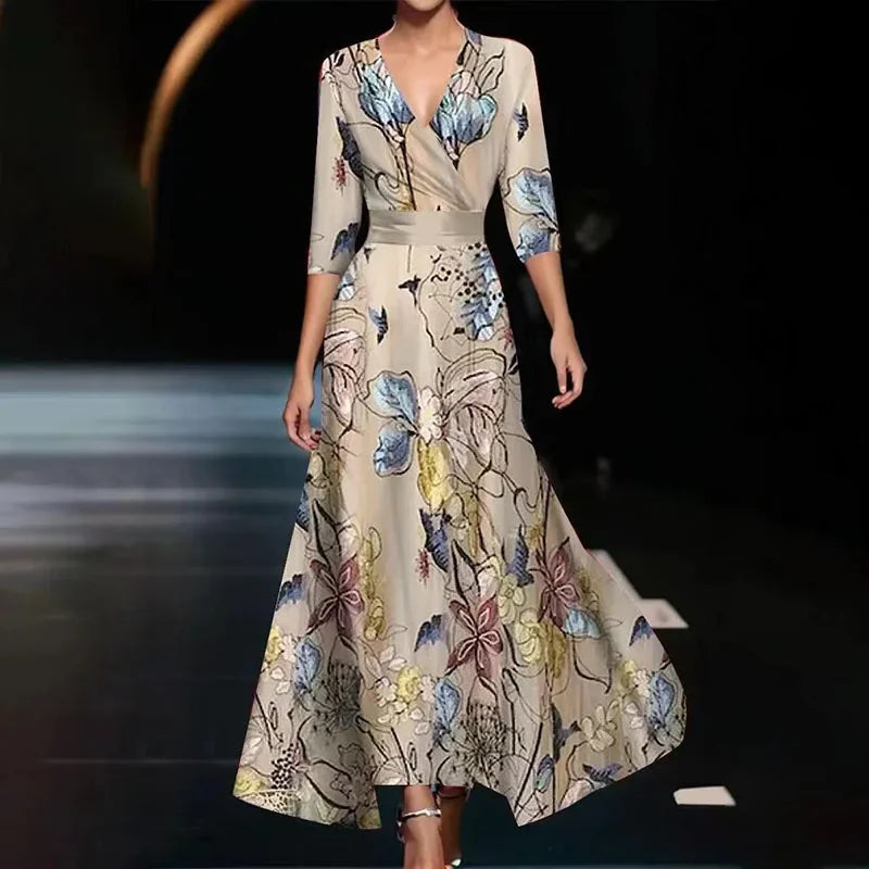 Stylish women's floral wrap maxi dress, featuring a cinched waist and flowy skirt for an elegant silhouette.